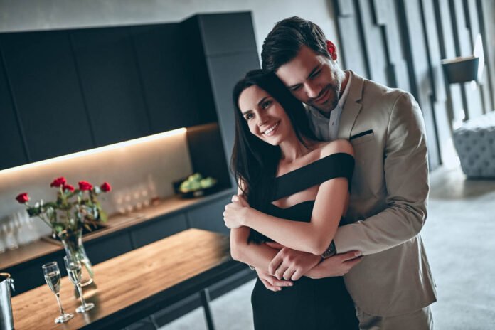 Stylish,Couple,Standing,On,Modern,Kitchen,Together.,Handsome,Bearded,Man